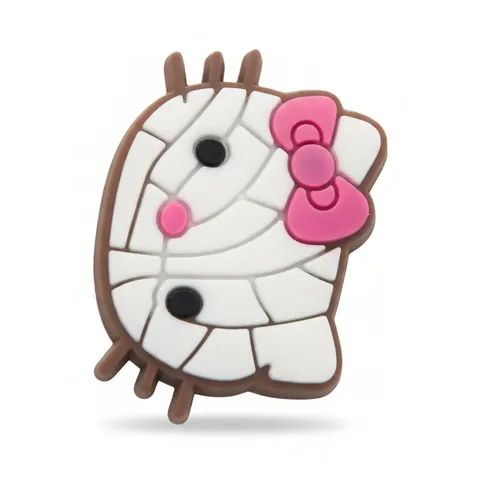 Jibbitz Hello Kitty momie : tête enroulée de bandelettes blanches, nœud rose fuchsia