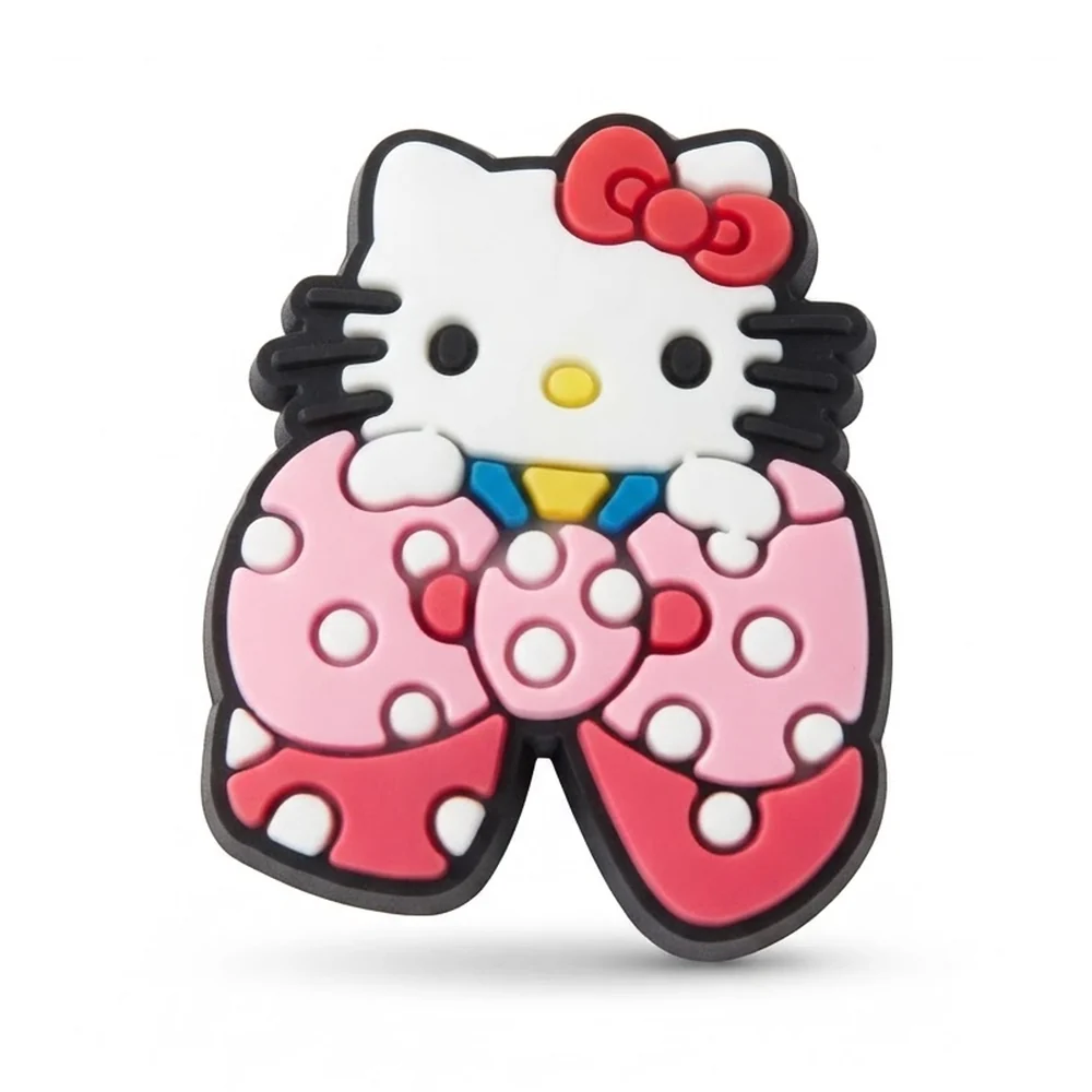 Jibbitz Hello Kitty derrière un grand nœud rose et corail à pois blancs, nœud rouge