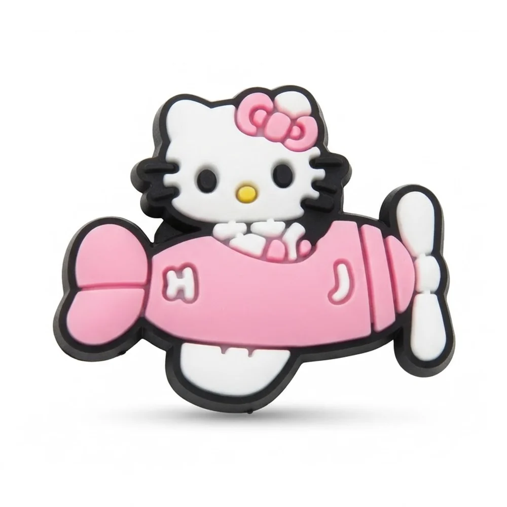 Jibbitz Hello Kitty pilotant un avion rose à hélice blanche, nœud rose
