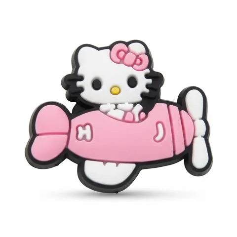 Jibbitz Hello Kitty pilotant un avion rose à hélice blanche, nœud rose